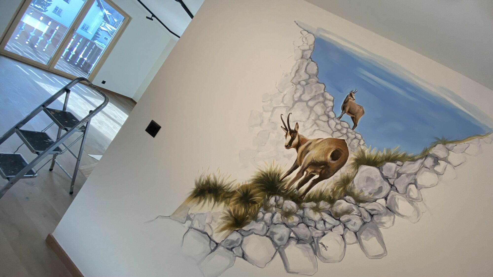 Murales artistico in Engadina: Due camosci